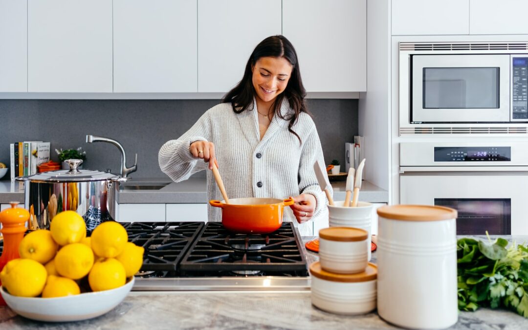 person cutting vegetables with knife