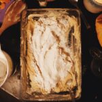 white ice cream on brown wooden tray