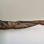 black and brown tribal tattoo